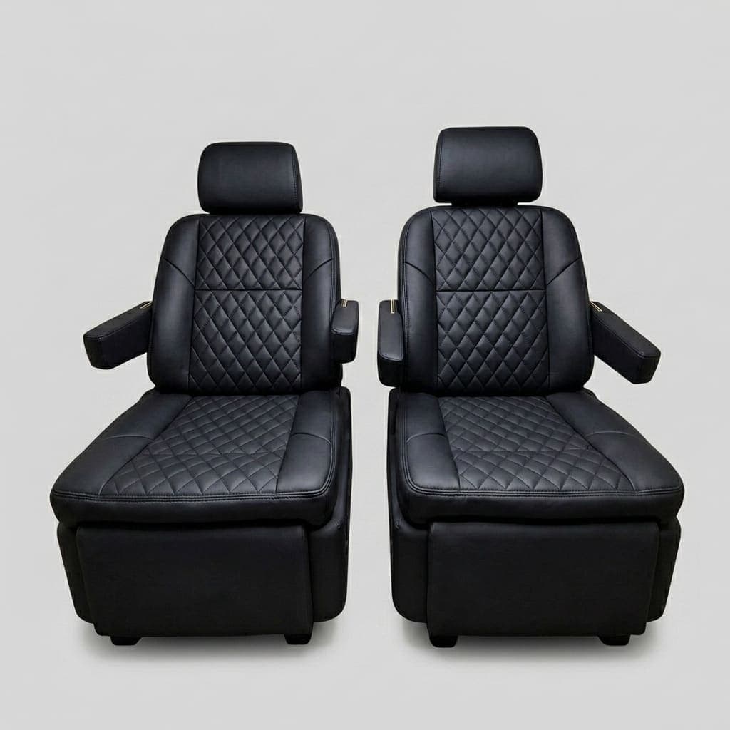 Premium black quilted leather captain's chairs reclined with footrests extended, showing electric reclining and footrest adjustment