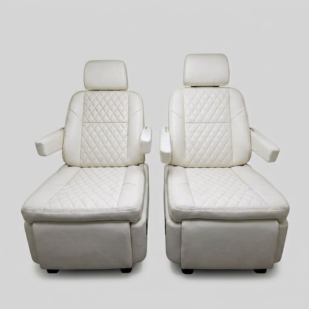 Premium business-inspired fully adjustable comfort seating in cream — two quilted ivory leather captain's chairs with diamond stitching, integrated headrests, and padded armrests